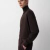 Aschefarbener Rollkragenpullover Aschefarbener Rollkragenpullover