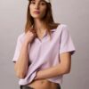 Baumwoll-Polo-Shirt mit konturierten Rippbündchen Baumwoll-Polo-Shirt mit konturierten Rippbündchen