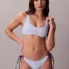 Bikini-Unterteile mit grafischem Monogram und seitlichen Bändern Bikini-Unterteile mit grafischem Monogram und seitlichen Bändern