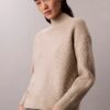 Feinstrick-Pullover mit lockerem Rollkragen Feinstrick-Pullover mit lockerem Rollkragen