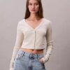 Gerippte, kurz geschnittene Strickjacke Gerippte, kurz geschnittene Strickjacke
