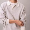 Glatter Polo-Pullover aus Baumwolle mit Waffelmuster Glatter Polo-Pullover aus Baumwolle mit Waffelmuster