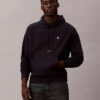 Hochwertiger, lockerer Monogram-Fleece-Hoodie aus Frottee Hochwertiger, lockerer Monogram-Fleece-Hoodie aus Frottee