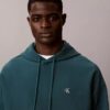 Hochwertiger, lockerer Monogram-Fleece-Hoodie aus Frottee Hochwertiger, lockerer Monogram-Fleece-Hoodie aus Frottee
