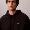 Hochwertiger, lockerer Monogram-Fleece-Hoodie aus Frottee Hochwertiger, lockerer Monogram-Fleece-Hoodie aus Frottee