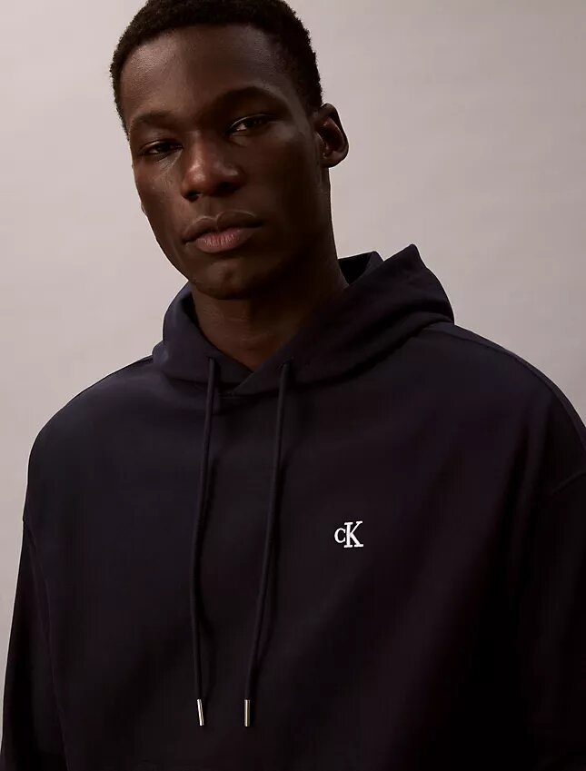 Hochwertiger, lockerer Monogram-Fleece-Hoodie aus Frottee Hochwertiger, lockerer Monogram-Fleece-Hoodie aus Frottee
