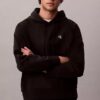Hochwertiger, lockerer Monogram-Fleece-Hoodie aus Frottee Hochwertiger, lockerer Monogram-Fleece-Hoodie aus Frottee