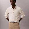 Jacquard-Polo-Pullover in lockerer Passform Jacquard-Polo-Pullover in lockerer Passform