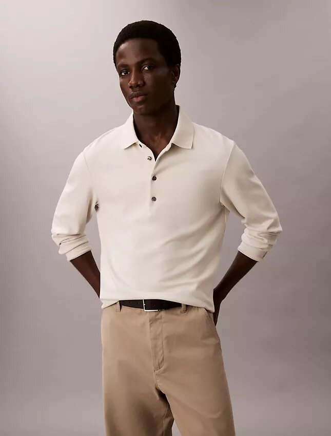 Jacquard-Polo-Pullover in lockerer Passform Jacquard-Polo-Pullover in lockerer Passform