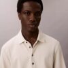 Jacquard-Polo-Pullover in lockerer Passform Jacquard-Polo-Pullover in lockerer Passform