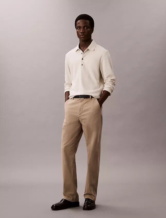 Jacquard-Polo-Pullover in lockerer Passform Jacquard-Polo-Pullover in lockerer Passform