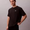 Kühlendes Piqué-T-Shirt mit Logo-Grafik in lockerer Passform Kühlendes Piqué-T-Shirt mit Logo-Grafik in lockerer Passform