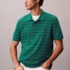 Klassisches Polohemd aus gestreiftem Baumwollpiqué Klassisches Polohemd aus gestreiftem Baumwollpiqué