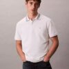 Klassisches Polohemd mit Monogram und Piqué-Einsätzen Klassisches Polohemd mit Monogram und Piqué-Einsätzen