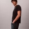 Klassisches T-Shirt mit doppeltem Monogram-Print Klassisches T-Shirt mit doppeltem Monogram-Print