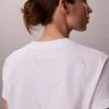 Klassisches T-Shirt mit durchgehendem Schriftzug-Logo Klassisches T-Shirt mit durchgehendem Schriftzug-Logo