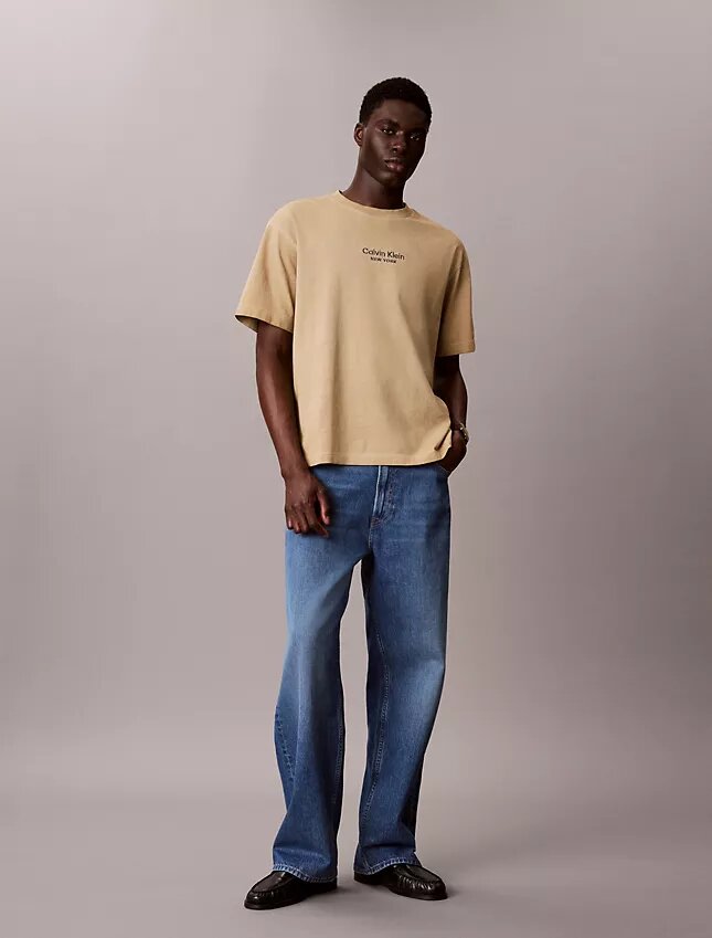 Klassisches T-Shirt mit Rundhalsausschnitt und Logo-Grafik in verwaschener Optik Klassisches T-Shirt mit Rundhalsausschnitt und Logo-Grafik in verwaschener Optik