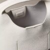 Kleine, locker sitzende Tasche mit Noppenstruktur