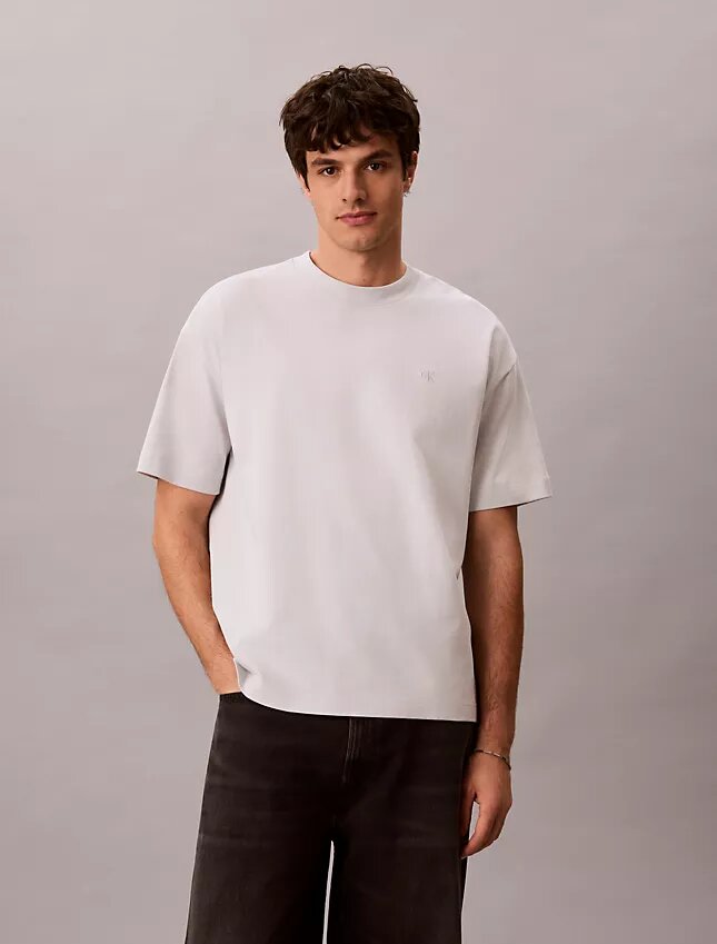 Lässiges T-Shirt mit Monologo-Grafik im Used-Look Lässiges T-Shirt mit Monologo-Grafik im Used-Look