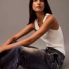 Maßgeschneiderte Hose mit Denim-Print