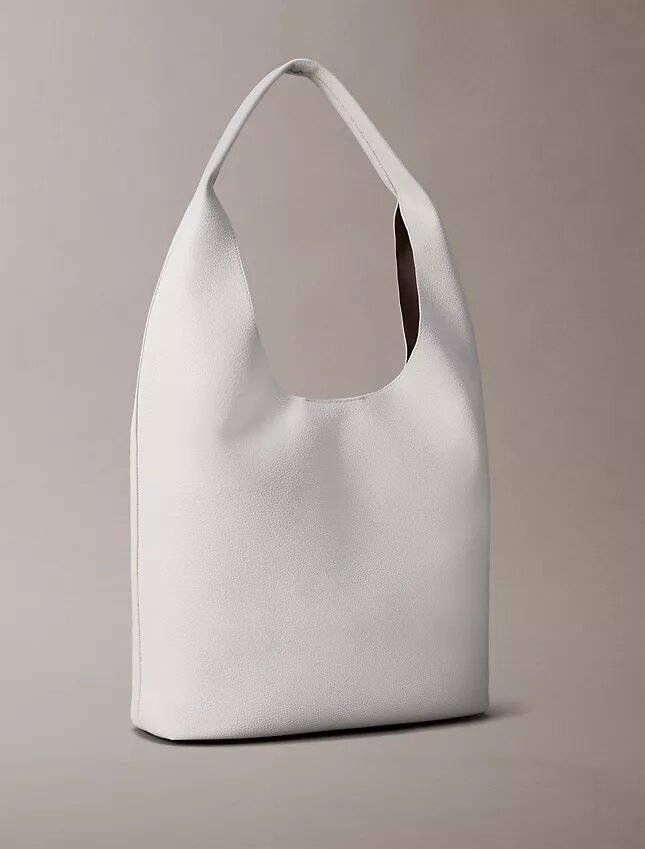 Mittlere, locker sitzende Tasche mit Noppenstruktur Mittlere, locker sitzende Tasche mit Noppenstruktur