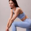 Moderne Sport-Leggings mit hohem Bund und Logo, 7/8-Länge