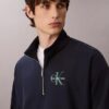 Monologo Premium-Frottee-Sweatshirt mit Viertelreißverschluss Monologo Premium-Frottee-Sweatshirt mit Viertelreißverschluss