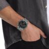 Multifunktionale Armbanduhr mit Gliederarmband Multifunktionale Armbanduhr mit Gliederarmband