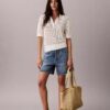 Polo-Shirt aus offenem Strick Polo-Shirt aus offenem Strick