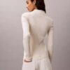 Polo-Strickjacke aus glatter Baumwollrippe Polo-Strickjacke aus glatter Baumwollrippe