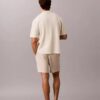 Pullover mit Knopfleiste und Netzstruktur
