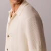 Pullover mit Knopfleiste und Netzstruktur