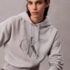 Relaxed-Hoodie mit Pailletten-Monogramm aus Fleece Relaxed-Hoodie mit Pailletten-Monogramm aus Fleece