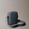 Reporter-Tasche mit genarter Oberfläche Reporter-Tasche mit genarter Oberfläche