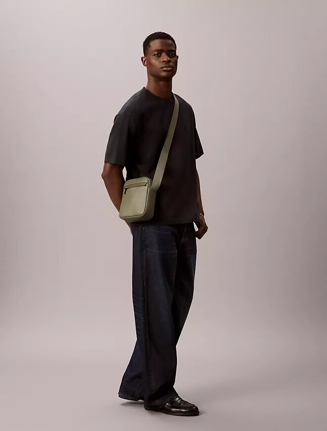 Reporter-Tasche mit genarter Oberfläche Reporter-Tasche mit genarter Oberfläche
