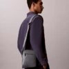 Reporter-Tasche mit genarter Oberfläche Reporter-Tasche mit genarter Oberfläche