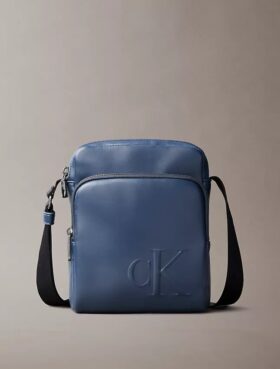 Reporter-Tasche mit geprägtem Monogram-Reißverschlusstasche