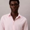 Schmal geschnittenes Stretch-Hemd mit Knopfleiste Schmal geschnittenes Stretch-Hemd mit Knopfleiste
