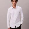 Schmal geschnittenes Stretch-Hemd mit Knopfleiste Schmal geschnittenes Stretch-Hemd mit Knopfleiste
