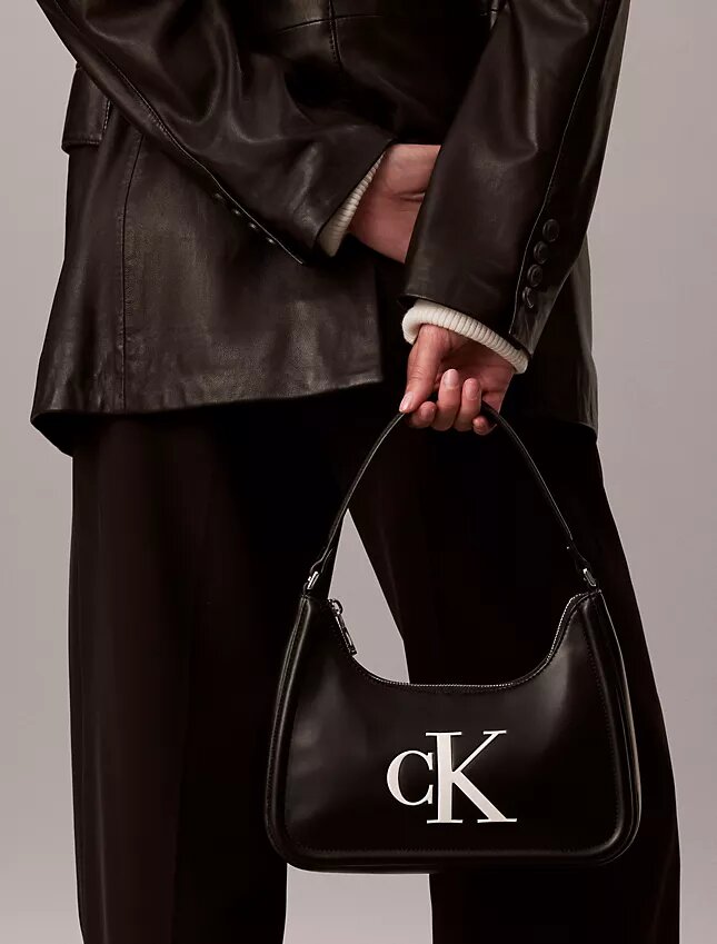 Schultertasche mit geprägtem Monogram Schultertasche mit geprägtem Monogram