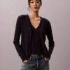 Set aus Baumwoll-Ripp-Strickjacke und Tanktop Set aus Baumwoll-Ripp-Strickjacke und Tanktop