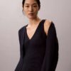 Set aus Baumwoll-Ripp-Strickjacke und Tanktop Set aus Baumwoll-Ripp-Strickjacke und Tanktop