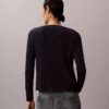 Set aus Baumwoll-Ripp-Strickjacke und Tanktop Set aus Baumwoll-Ripp-Strickjacke und Tanktop