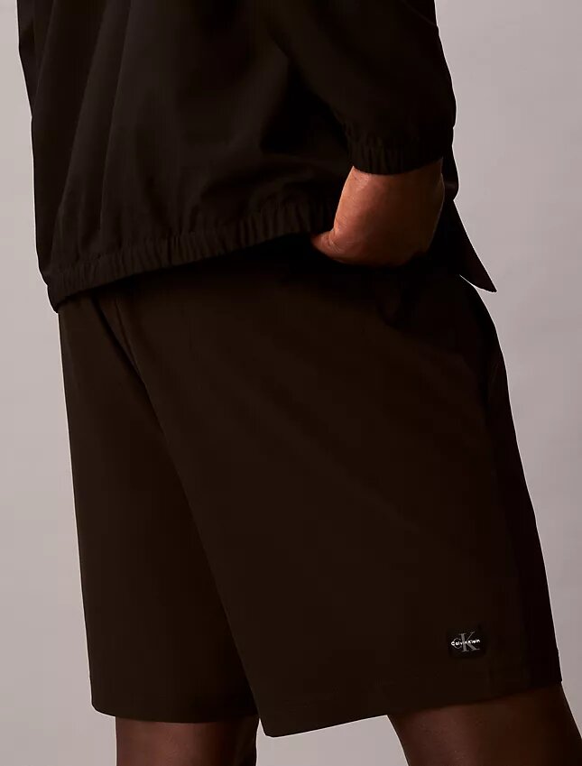 Shorts mit gewebtem Monogram Shorts mit gewebtem Monogram