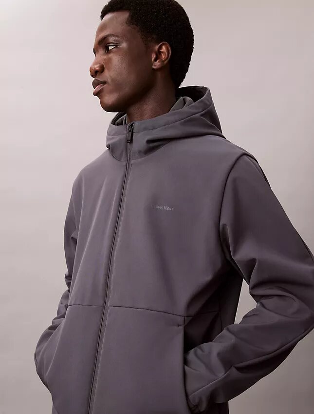 Softshell-Jacke mit Kapuze und Reißverschluss Softshell-Jacke mit Kapuze und Reißverschluss