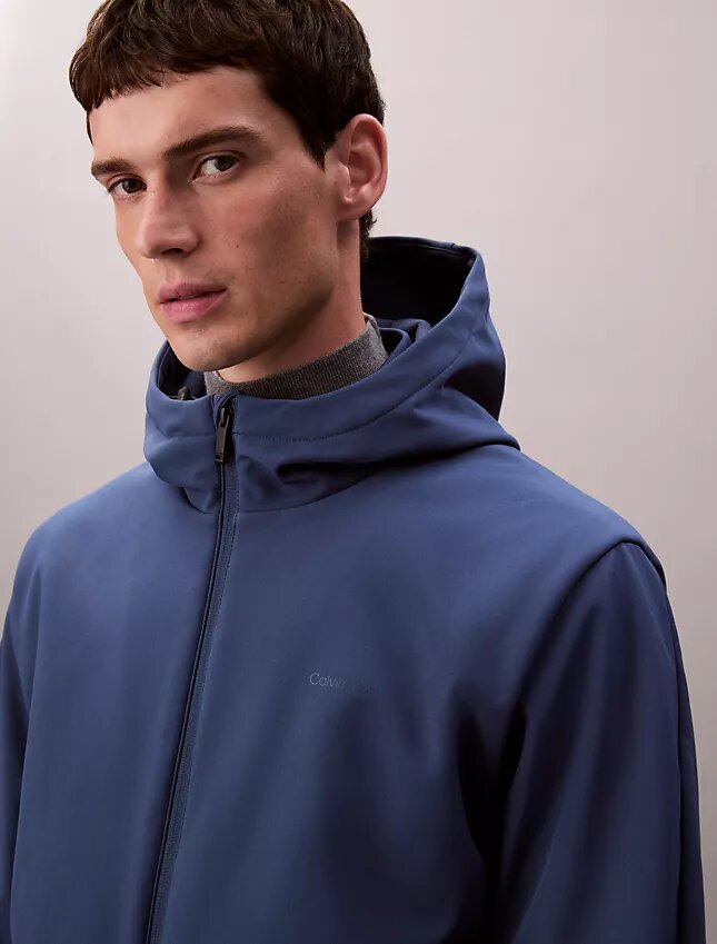 Softshell-Jacke mit Kapuze und Reißverschluss Softshell-Jacke mit Kapuze und Reißverschluss