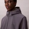 Softshell-Jacke mit Kapuze und Reißverschluss Softshell-Jacke mit Kapuze und Reißverschluss