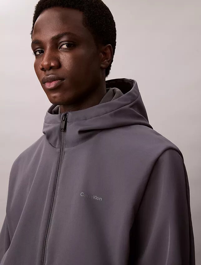 Softshell-Jacke mit Kapuze und Reißverschluss Softshell-Jacke mit Kapuze und Reißverschluss