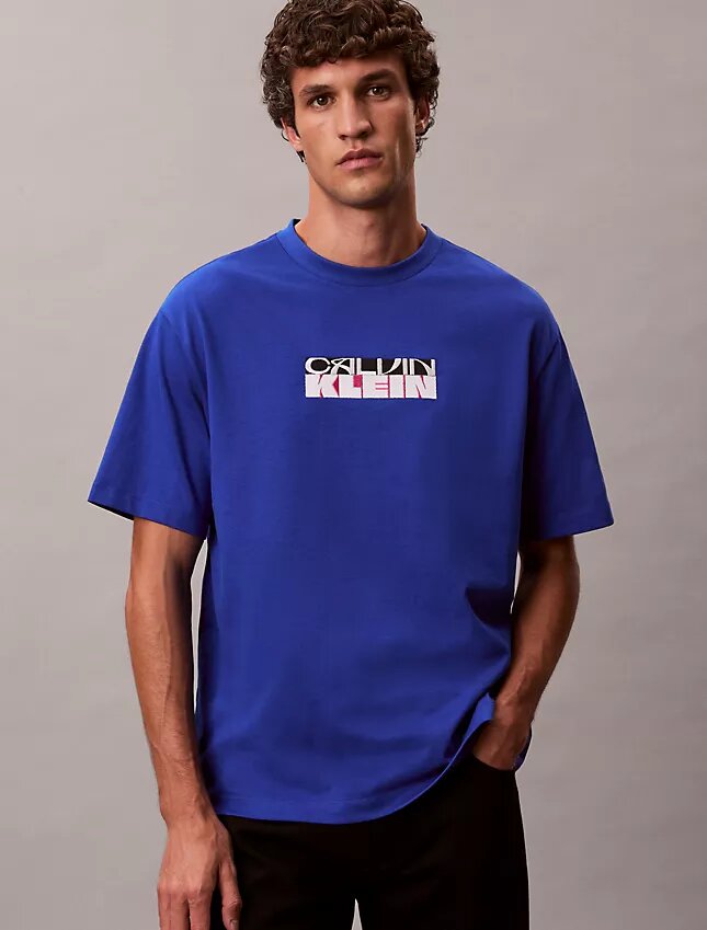T-Shirt mit Block-Logo-Grafik in lockerer Passform T-Shirt mit Block-Logo-Grafik in lockerer Passform