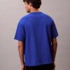 T-Shirt mit Block-Logo-Grafik in lockerer Passform T-Shirt mit Block-Logo-Grafik in lockerer Passform